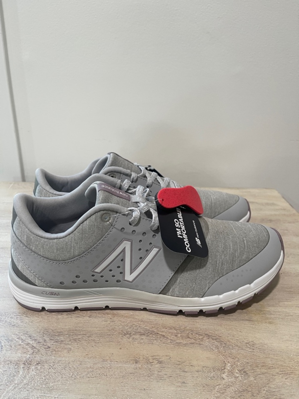 New Balance Light Gray Sneakers with Mauve Accents